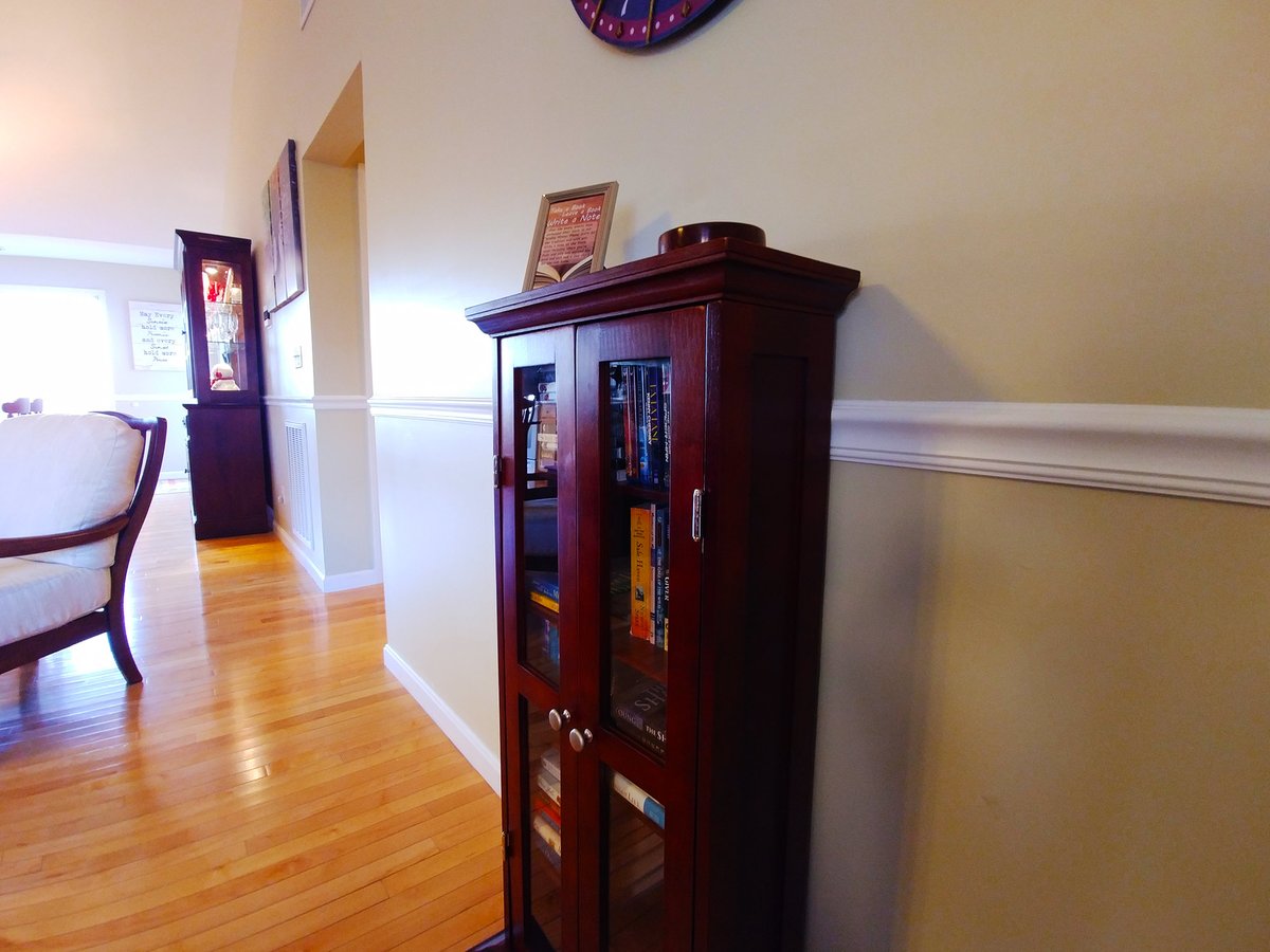 Book cabinet beside the dining area